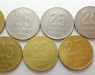 Coleccionistas pagan más de $10.000 por monedas de 25 centavos con un particular error